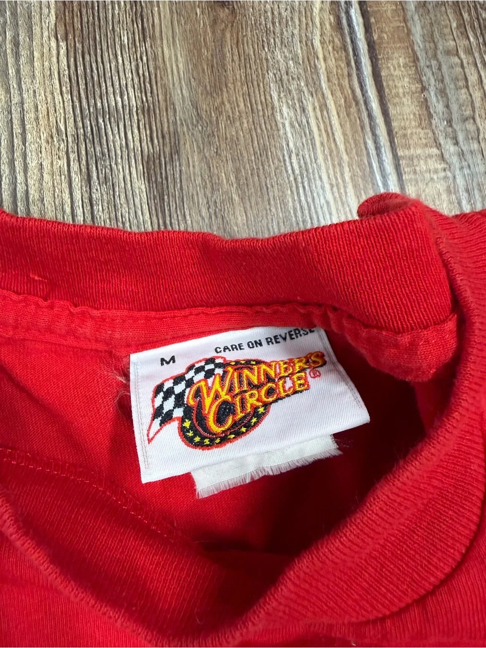 Vintage Red Dale Earnhardt Jr. NASCAR tee with graphic of a race car and the wor